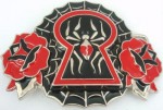  spider in door lock cutout med red and black belt buckle