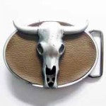  steer skull with leather background on oval belt buckle