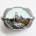  cowboy on horse on a hill western belt buckle